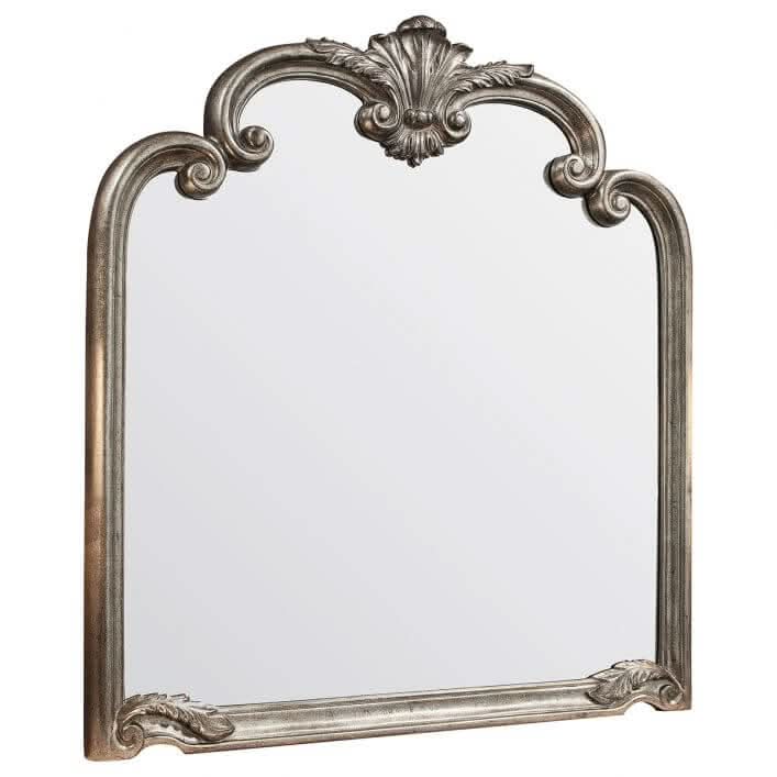 Ballagio Overmantle Mirror in Silver Leaf with ornate detailing, 104cm x 115cm, elegant decorative piece reflecting light.