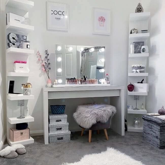 Hepburn Hollywood Mirror 80x60cm with LED lights on a vanity table, surrounded by chic decor for a glamorous studio setup.