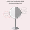 The Pre Order Mid June Illuminated Round Cosmetic Mirror (20cm, rechargeable) on an adjustable stand is shown. One side shows our HD clarity; the other, a normal mirror from others. Text above: Enjoy High Definition Light.
