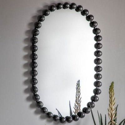 Black Pill Mirror with oversized beading design and bold black frame, ideal for modern home decor. Delivery arranged within 7-10 days.