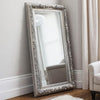 Silver ornate leaner full-length mirror in a bedroom setting with detailed frame, 173cm x 87cm, suitable for portrait or landscape orientation.