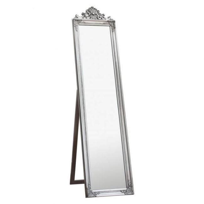 Elegant wooden cheval floor mirror with silver leaf finish and decorative crest, standing on a supportive base.